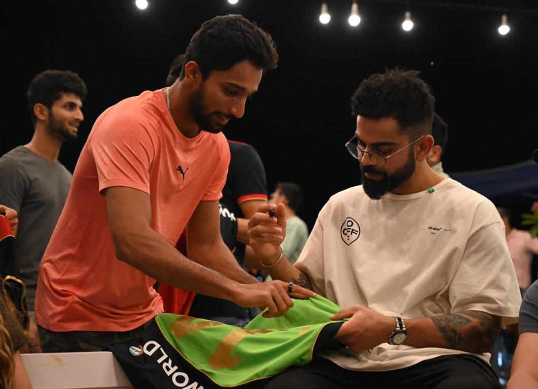 Mohammed Azharuddeen took to social media to post a picture of Virat Kohli autographing a jersey for him.
